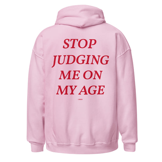 STOP JUDGING ME ON MY AGE HOODIE - Red Font